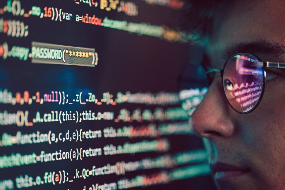 hacker using computer smartphone and coding to st 2023 11 27 05 22 53 utc